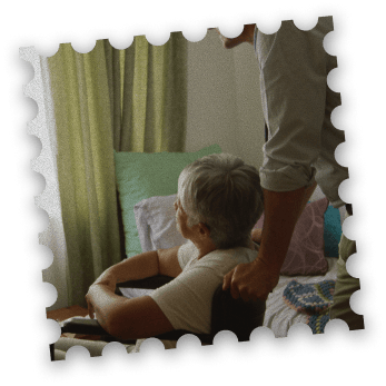 A home care aide helping a family